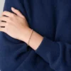 Ellis Pavé Glitz Roségoldfarbenes Messing-Tennisarmband Ellis Pavé Glitz Roségoldfarbenes Messing-Tennisarmband