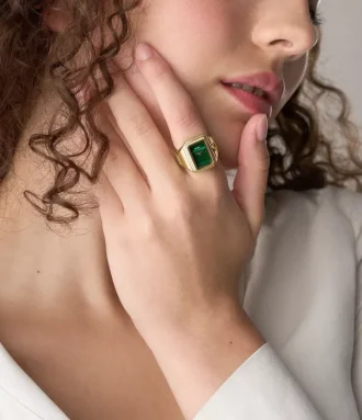 Raquel Uhrenring Zweizeigeruhr aus goldfarbenem Edelstahl
